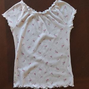 A light pink floral shirt